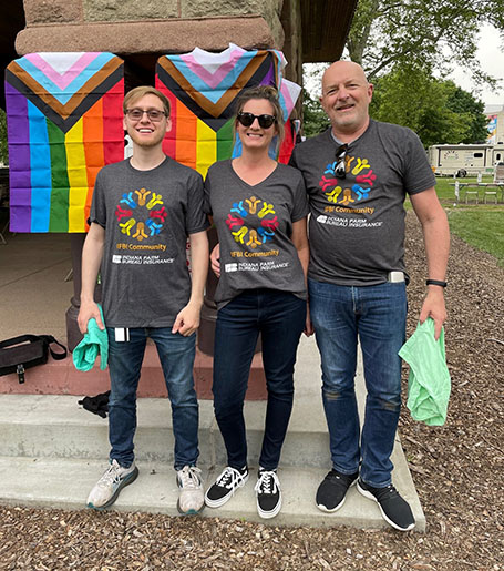 Chris Simmerman with two other IFBI employees volunteering at the Indy Pride Parade