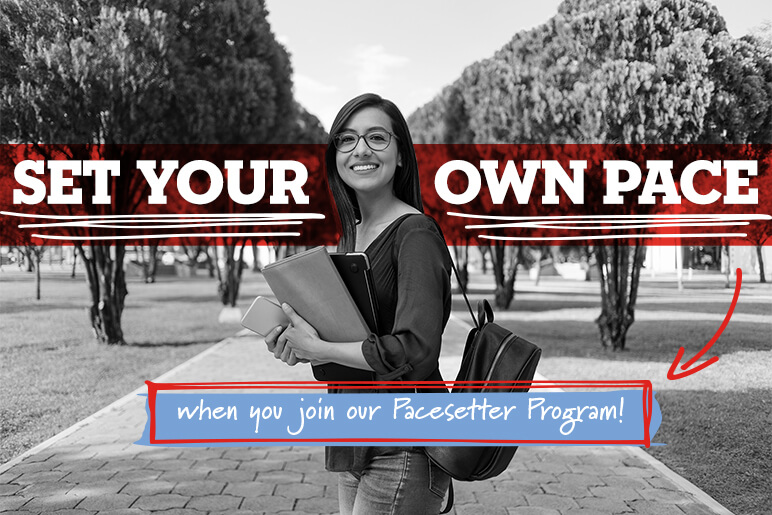 A girl smiling on a college campus with books in her hand and a backpack with the words, 